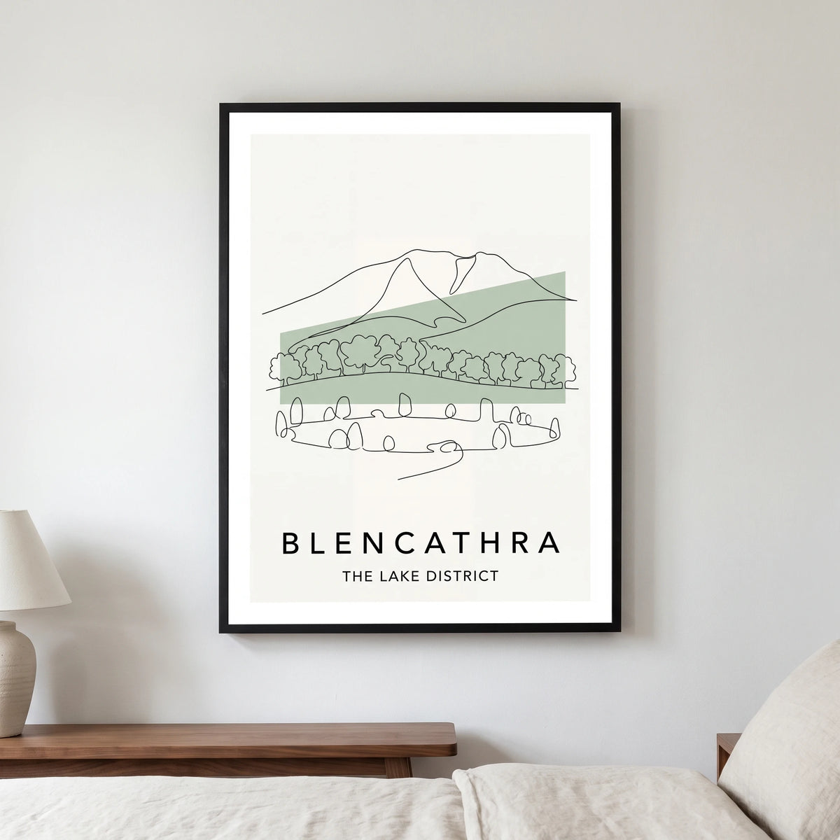 Blencathra travel poster in a black frame, hanging in a bedroom3