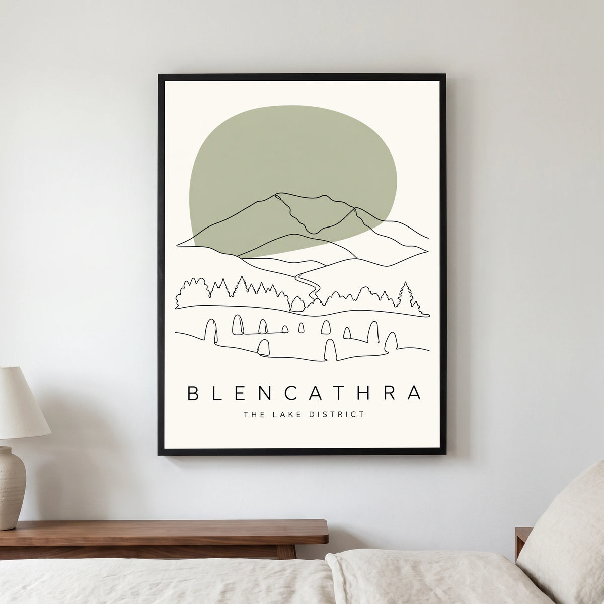 Blencathra travel poster in a black frame, hanging in a bedroom3