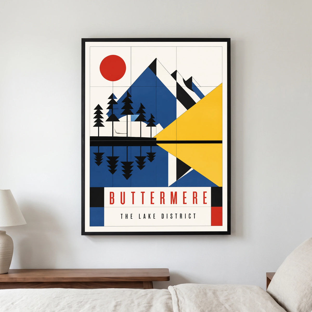 Buttermere travel poster in a black frame, hanging in a bedroom3