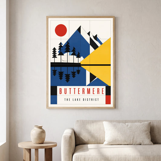 Buttermere travel poster in a natural frame, hanging in a living