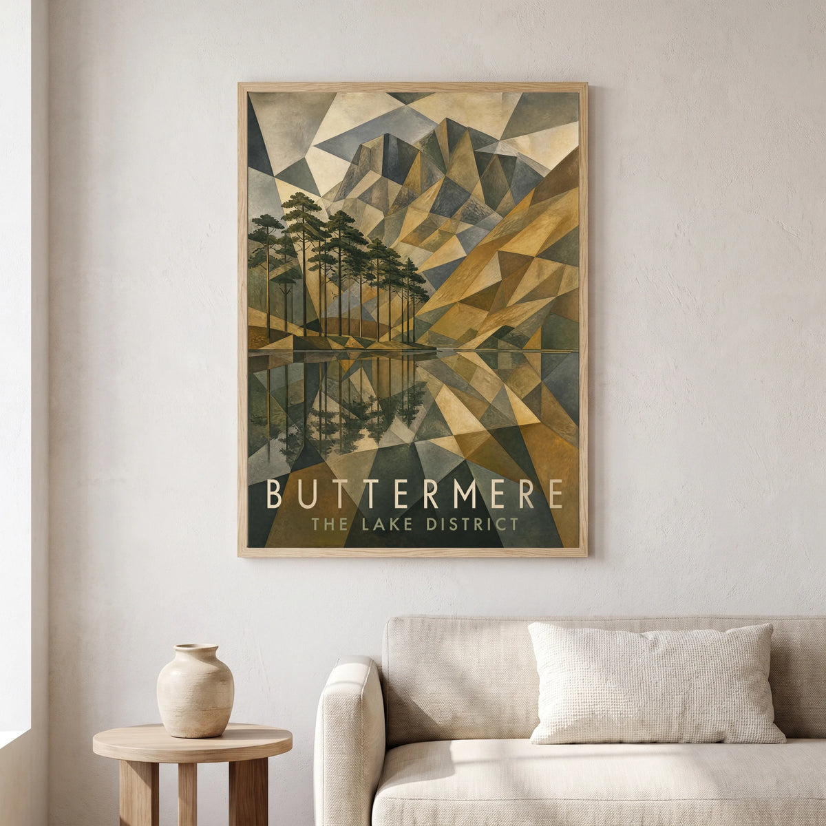 Buttermere travel poster in a natural frame, hanging in a living