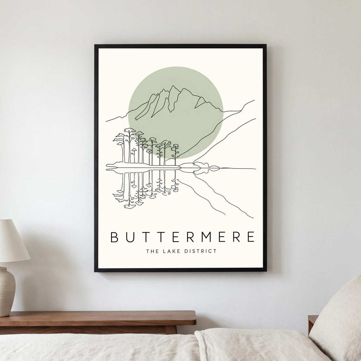 Buttermere travel poster in a black frame, hanging in a bedroom3