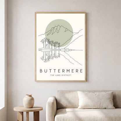 Buttermere travel poster in a natural frame, hanging in a living