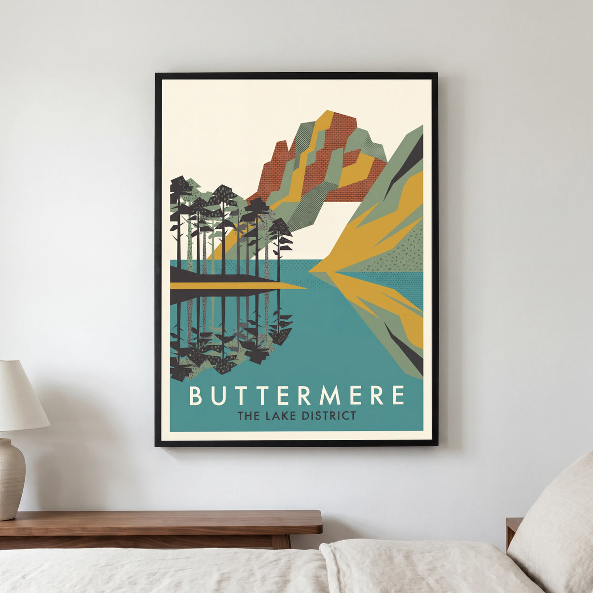 Buttermere travel poster in a black frame, hanging in a bedroom3
