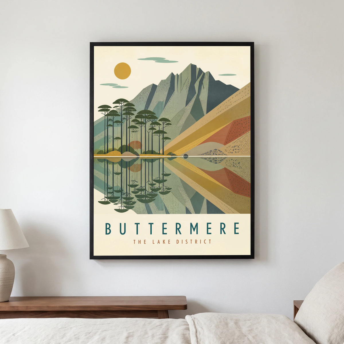 Buttermere travel poster in a black frame, hanging in a bedroom3