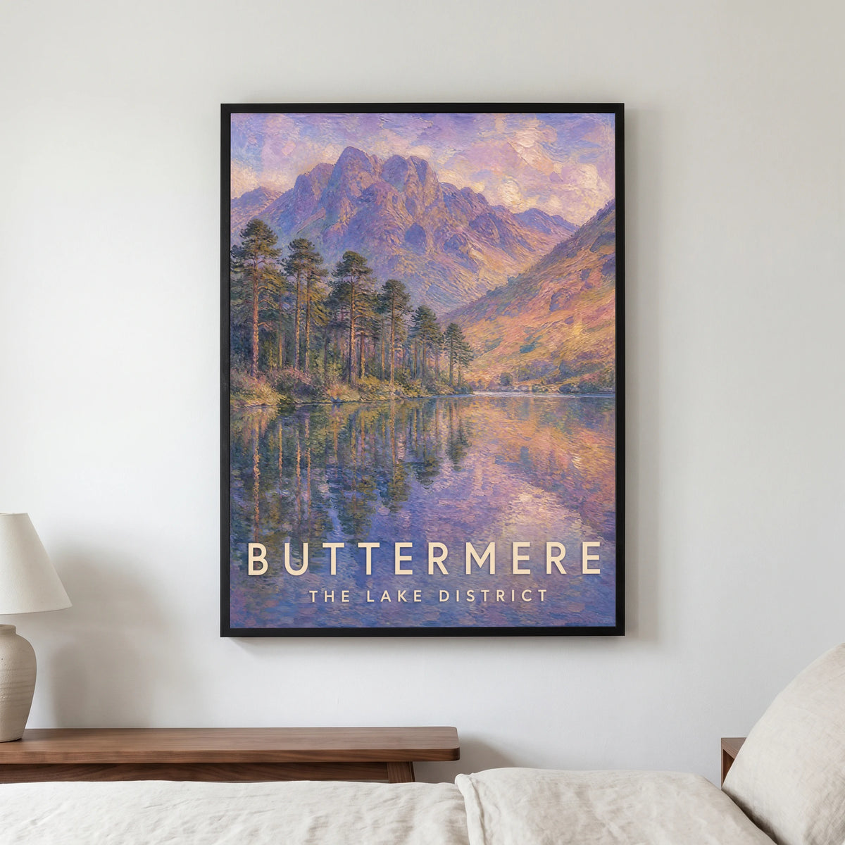 Buttermere travel poster in a black frame, hanging in a bedroom3