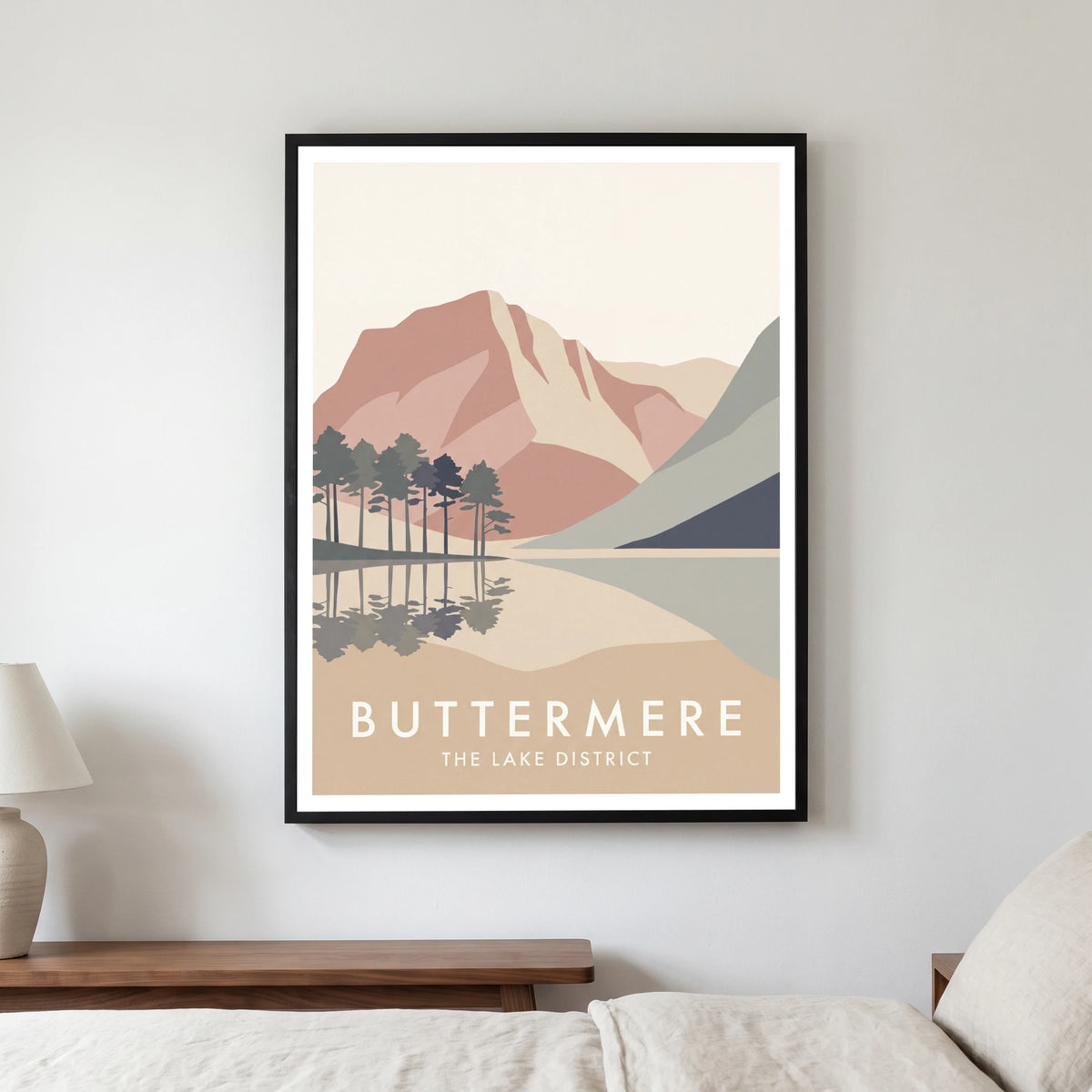 Buttermere travel poster in a black frame, hanging in a bedroom3