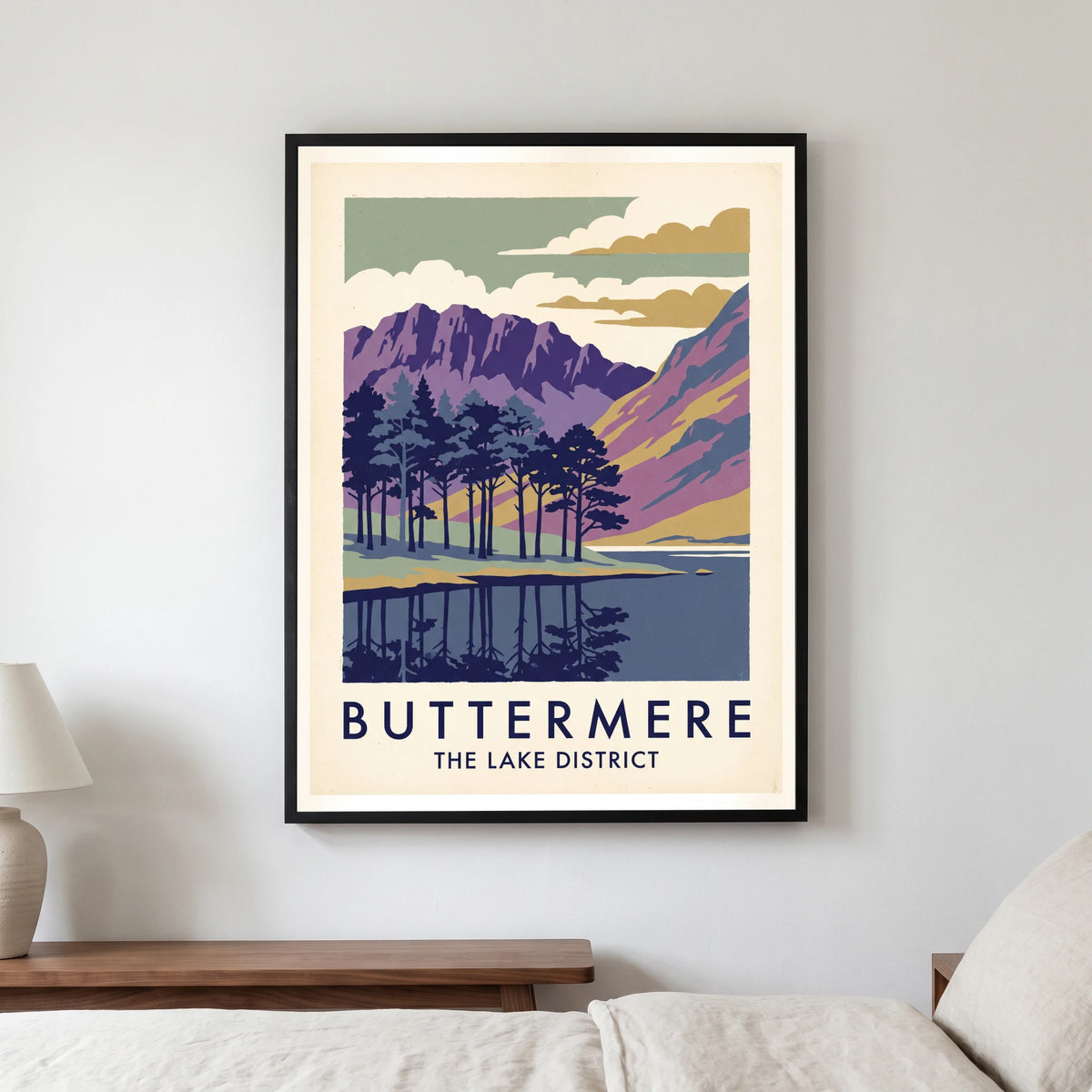 Buttermere travel poster in a black frame, hanging in a bedroom3