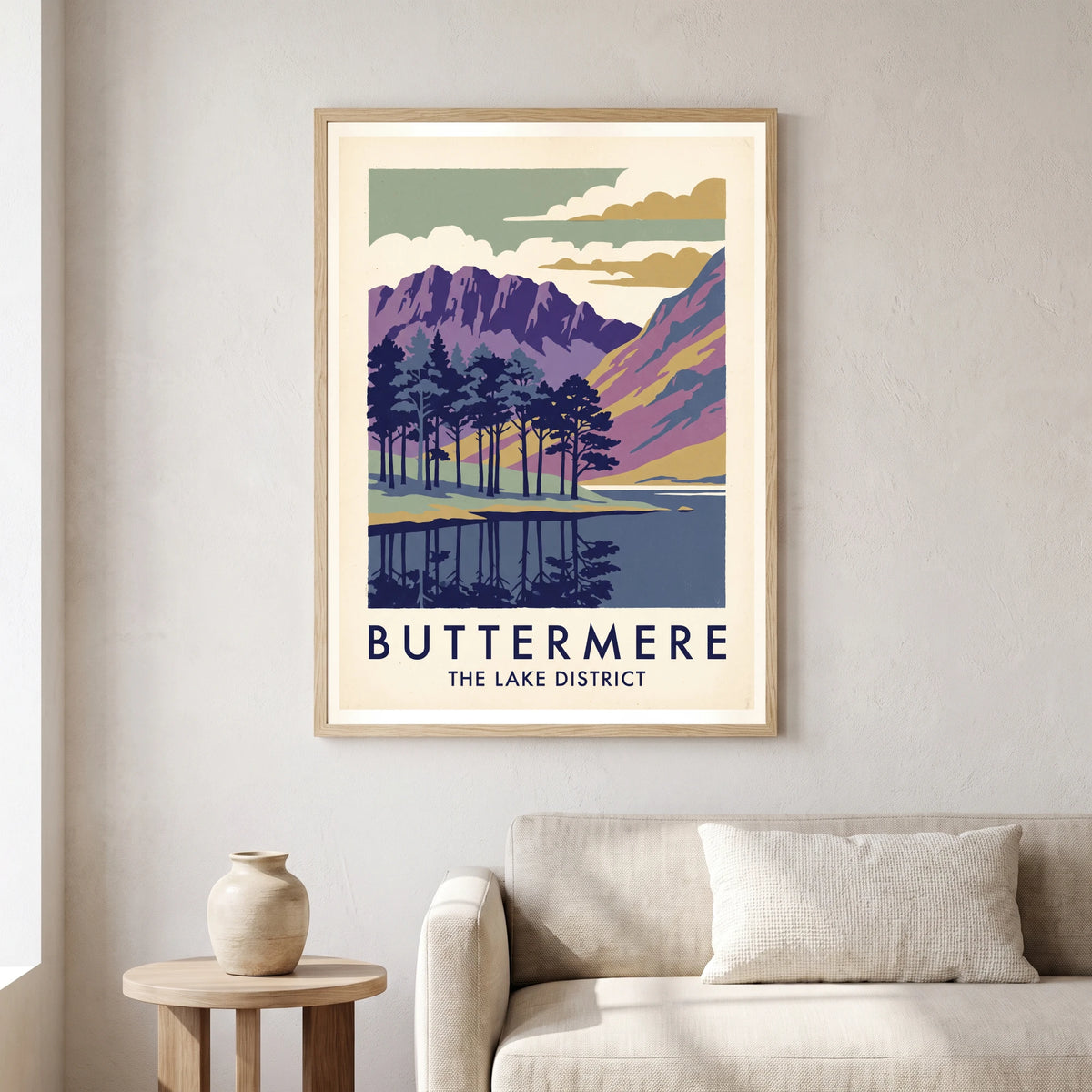 Buttermere travel poster in a natural frame, hanging in a living