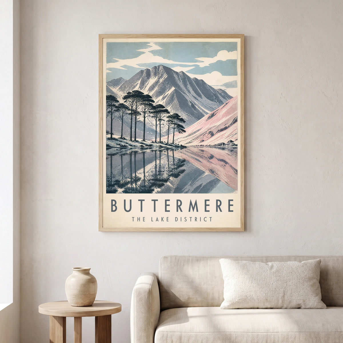 Buttermere travel poster in a natural frame, hanging in a living