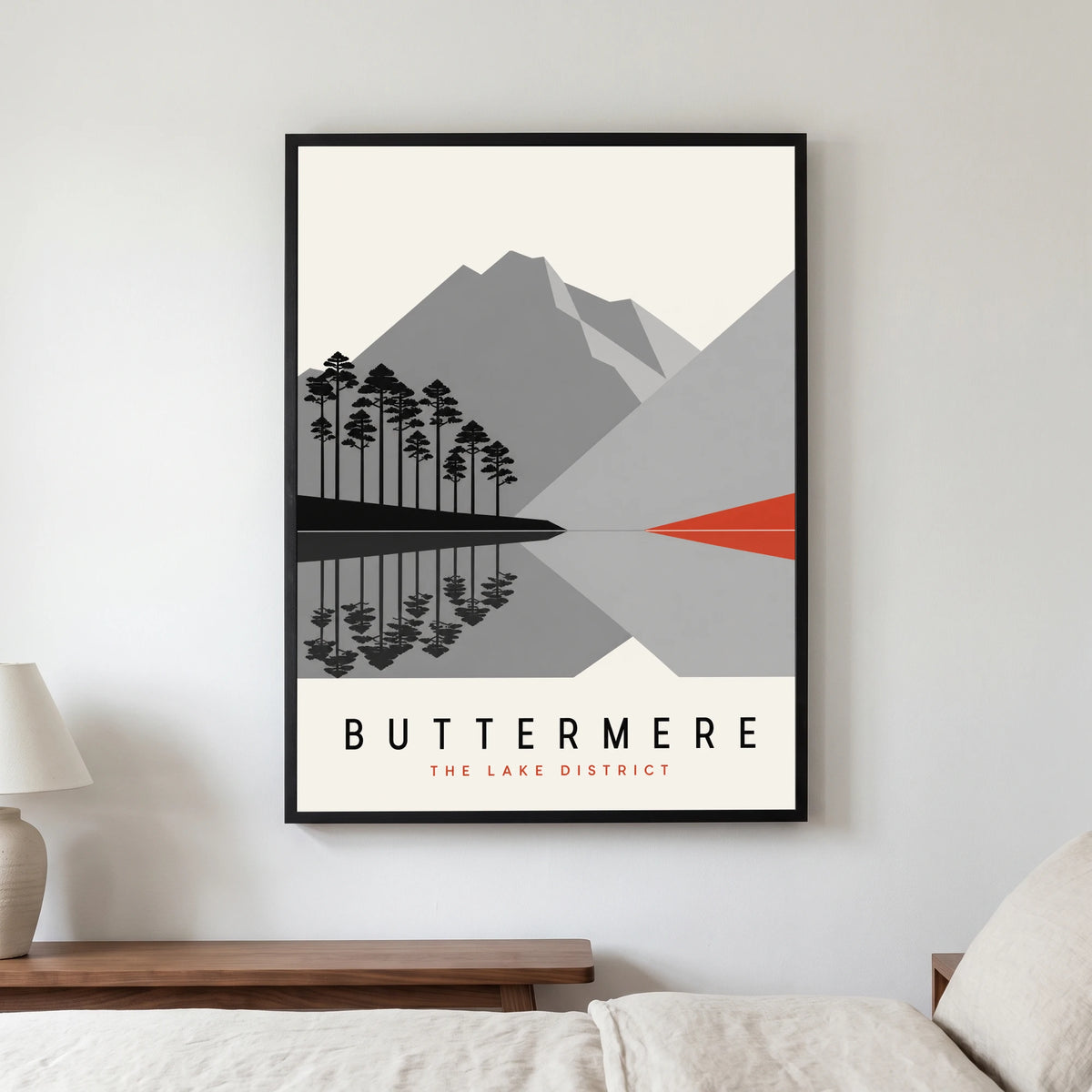 Buttermere travel poster in a black frame, hanging in a bedroom3