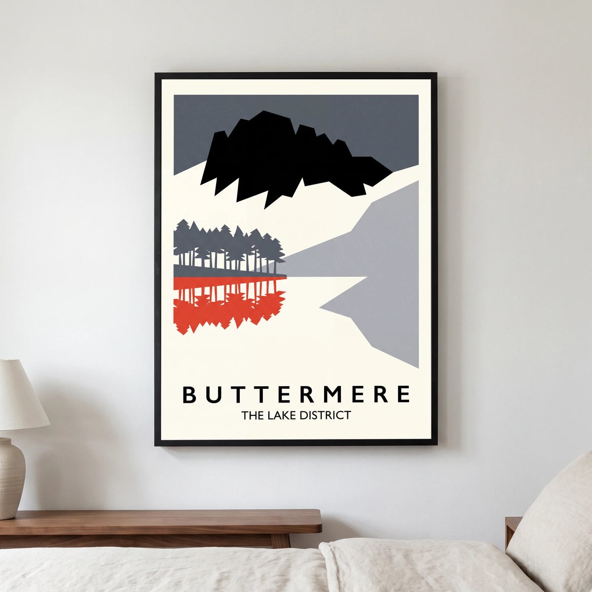 Buttermere travel poster in a black frame, hanging in a bedroom3