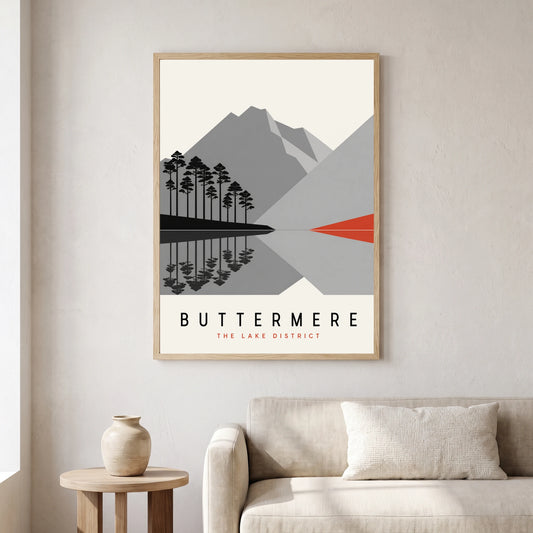Buttermere travel poster in a natural frame, hanging in a living