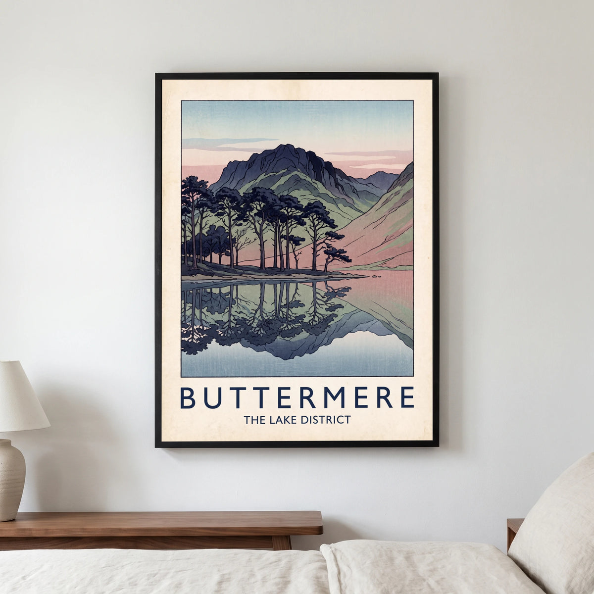 Buttermere travel poster in a black frame, hanging in a bedroom3