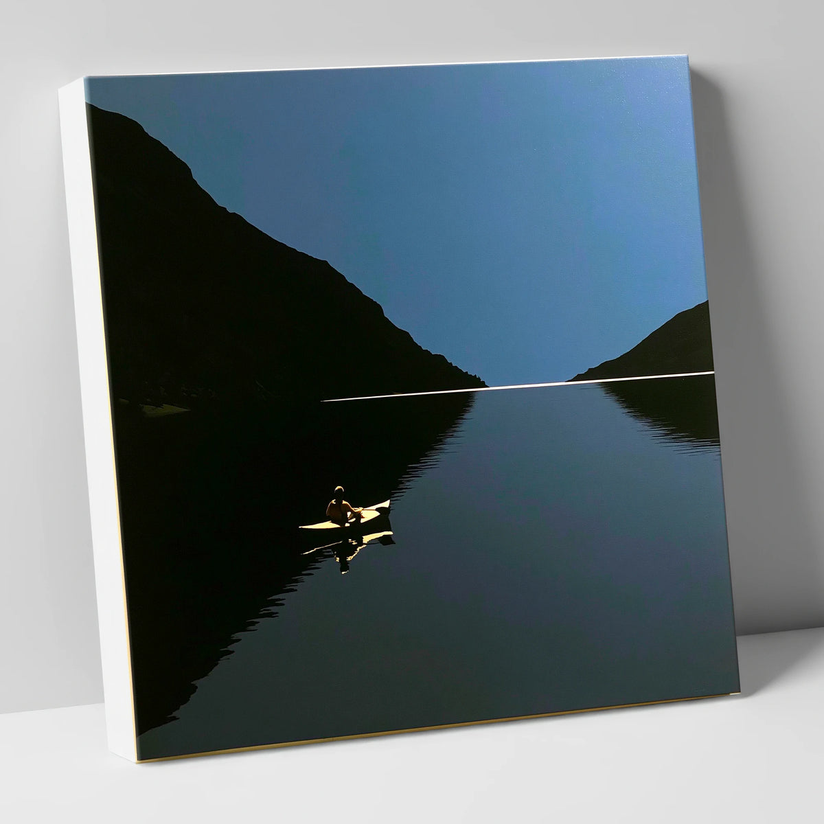 Illuminated Kayak on Dark Lake lake district walking canvas wall art