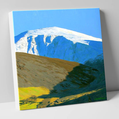 Sunlight on Snow Capped Raise lake district fell canvas wall art
