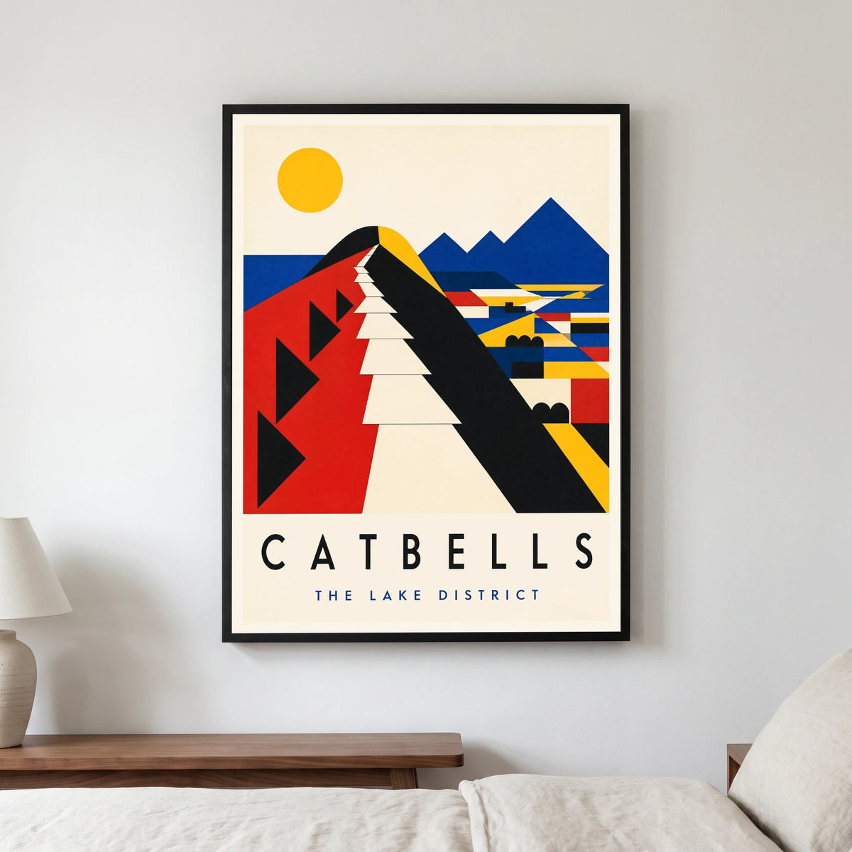 Catbells travel poster in a black frame, hanging in a bedroom3