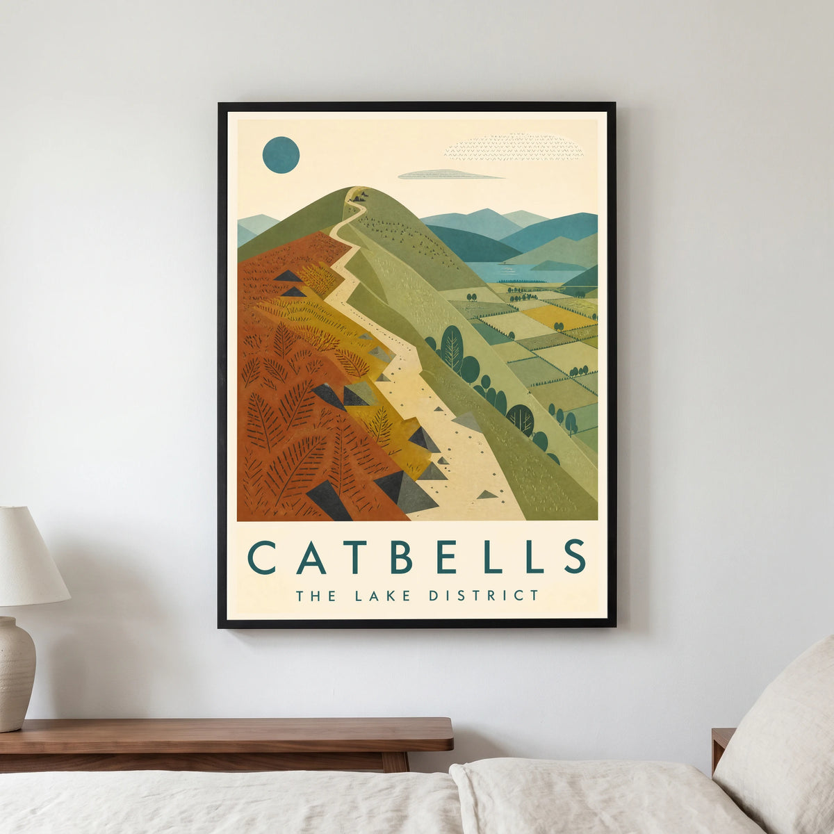 Catbells travel poster in a black frame, hanging in a bedroom3