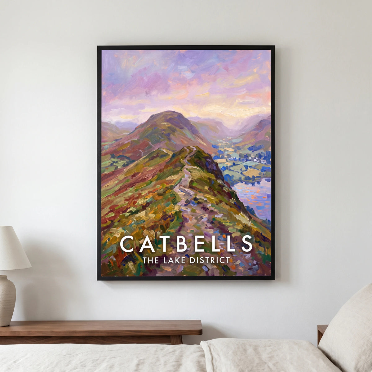 Catbells travel poster in a black frame, hanging in a bedroom3