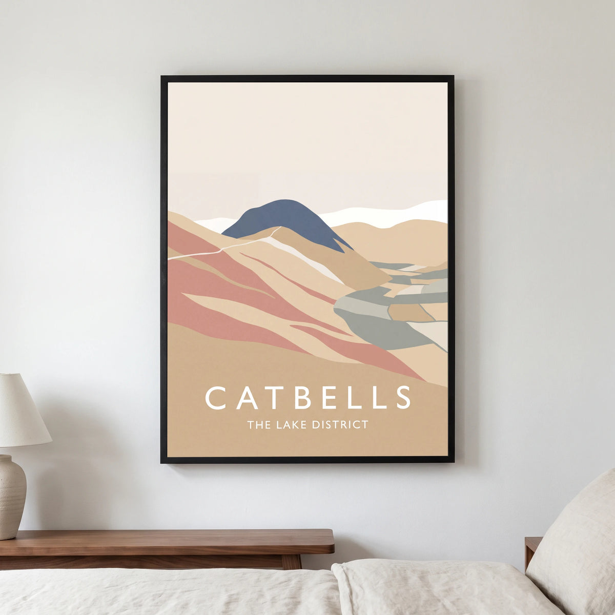 Catbells travel poster in a black frame, hanging in a bedroom3
