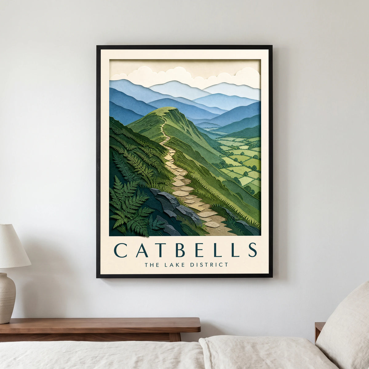 Catbells travel poster in a black frame, hanging in a bedroom3