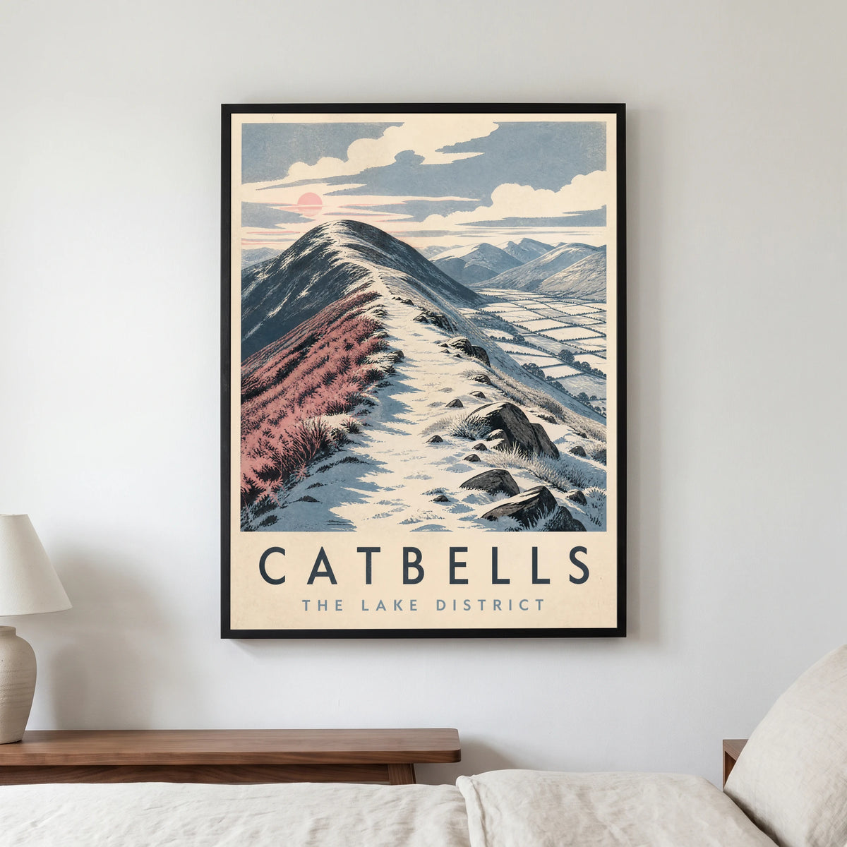 Catbells travel poster in a black frame, hanging in a bedroom3