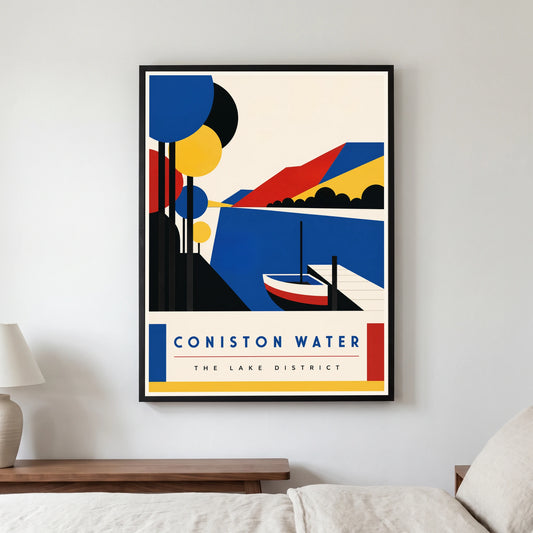 Coniston Water travel poster in a black frame, hanging in a bedroom3