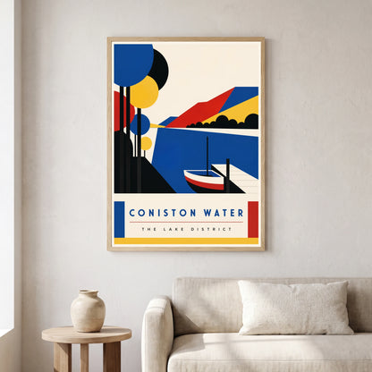 Coniston Water travel poster in a natural frame, hanging in a living