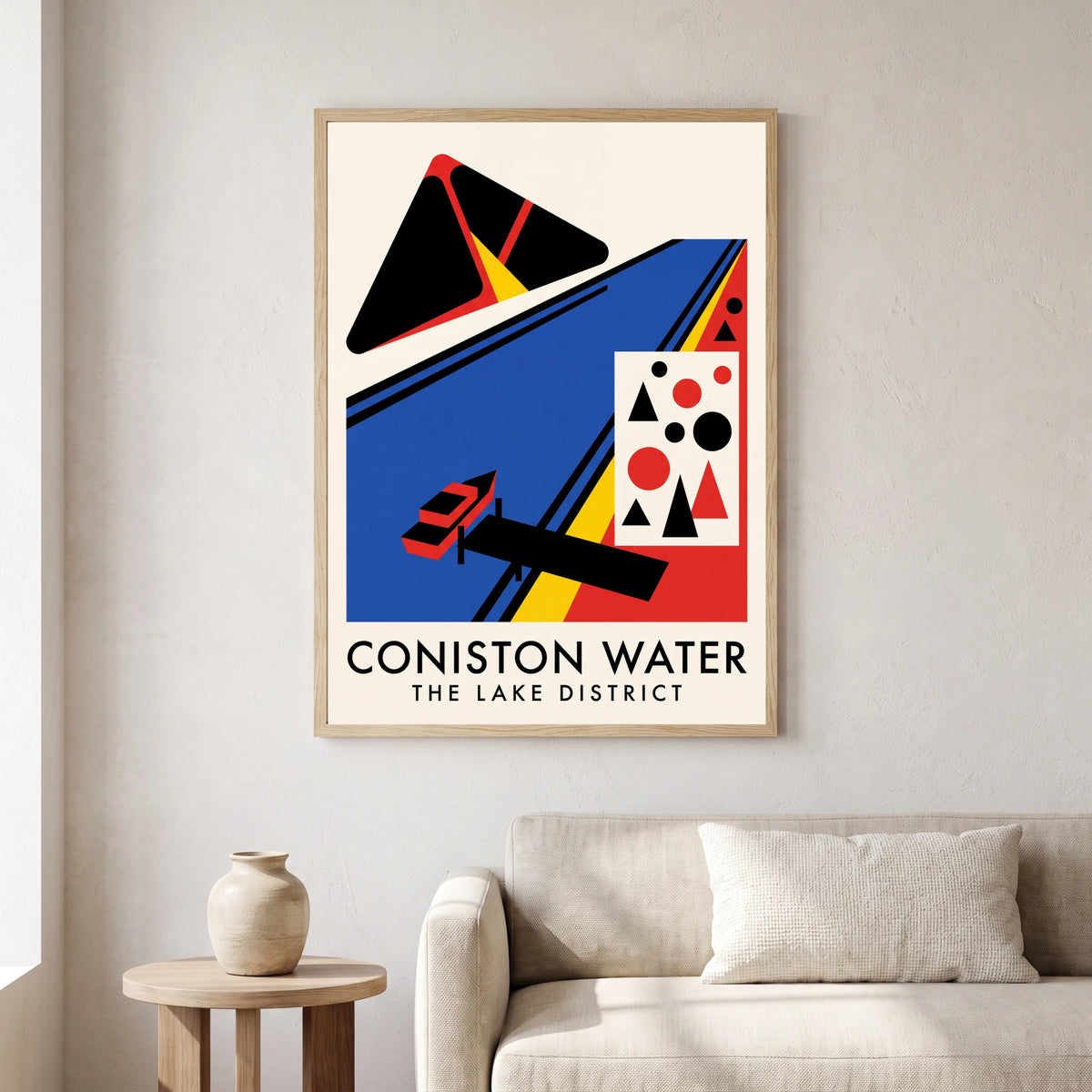 Coniston Water travel poster in a natural frame, hanging in a living
