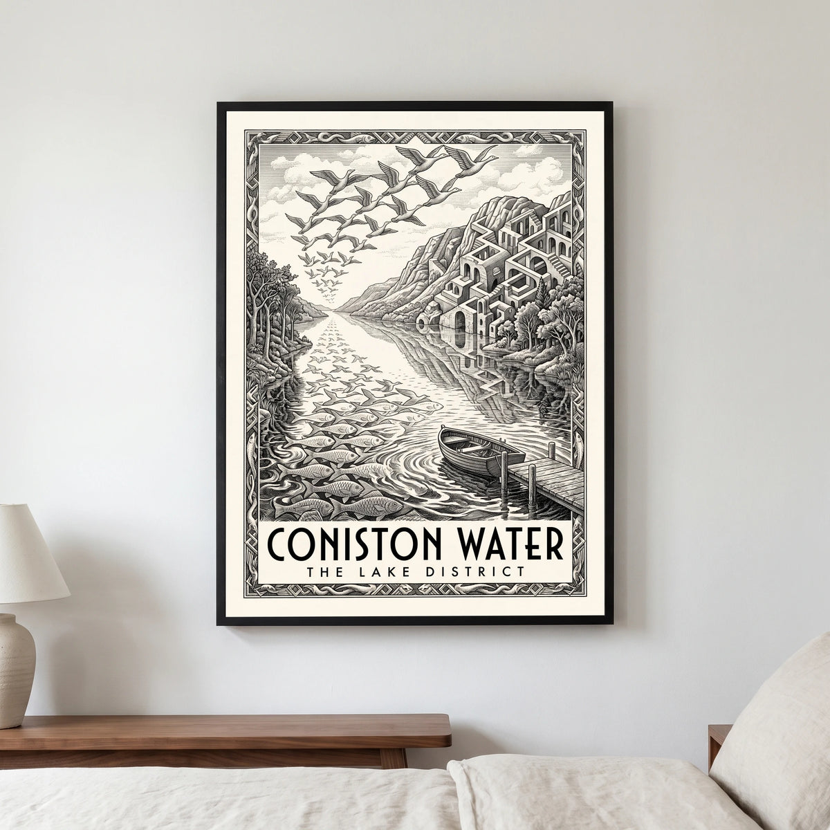 Coniston Water travel poster in a black frame, hanging in a bedroom3