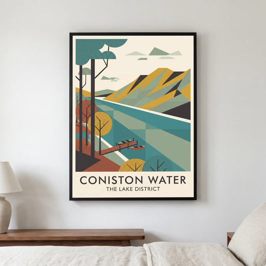 Coniston Water travel poster in a black frame, hanging in a bedroom3