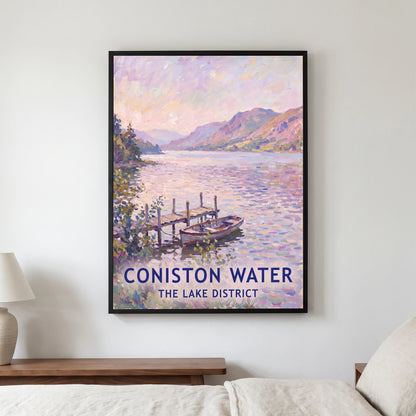 Coniston Water travel poster in a black frame, hanging in a bedroom3