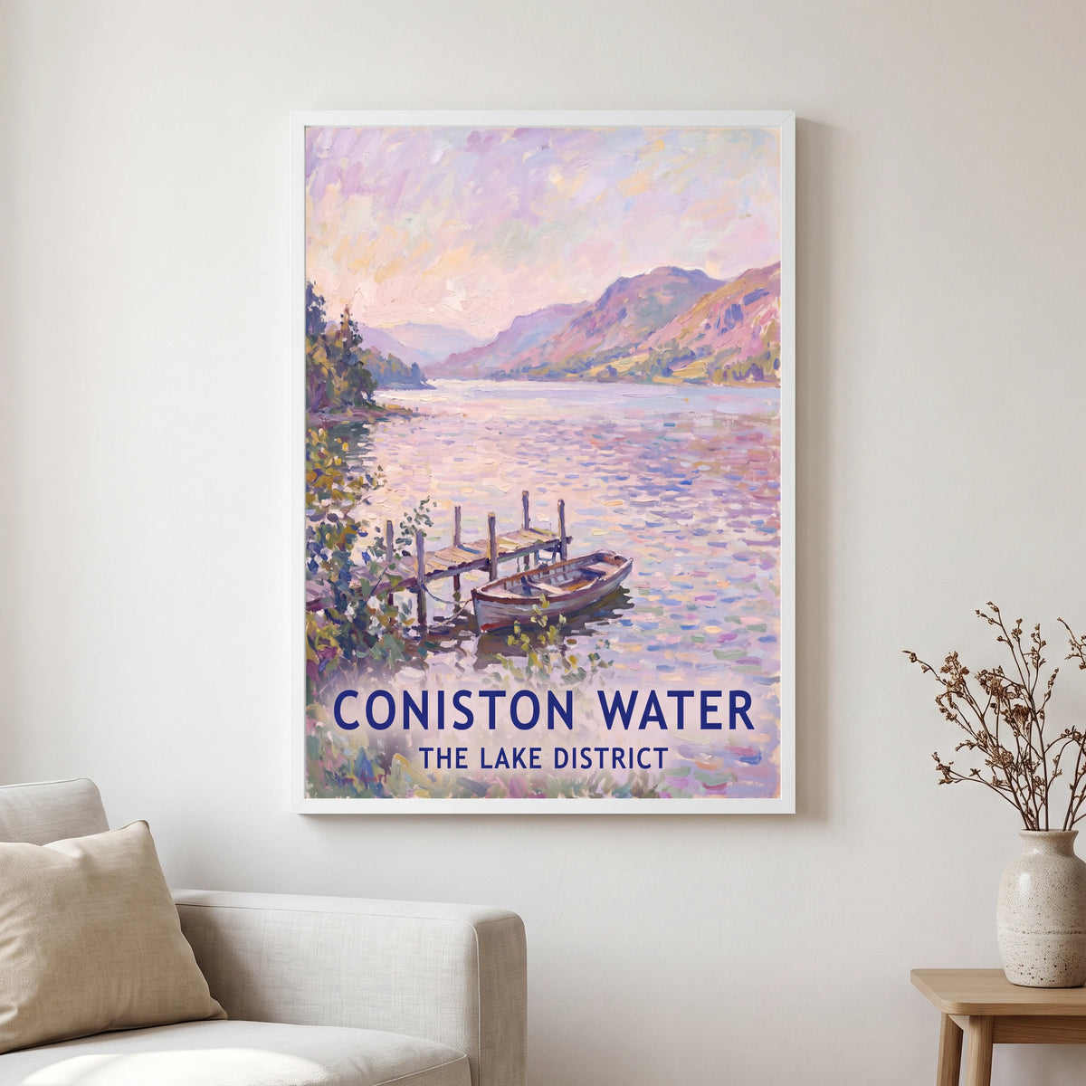 Coniston Water travel poster in a white frame, hanging in a living2