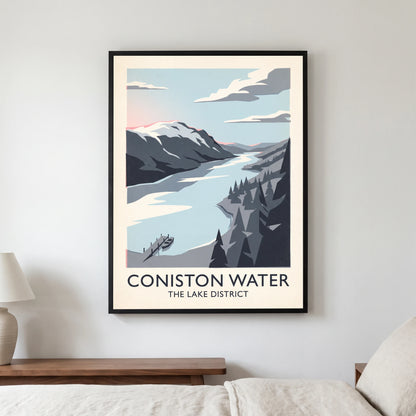 Coniston Water travel poster in a black frame, hanging in a bedroom3