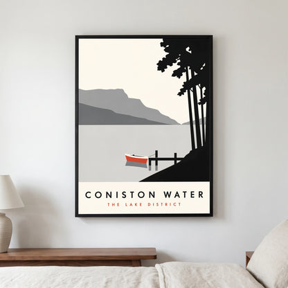 Coniston Water travel poster in a black frame, hanging in a bedroom3