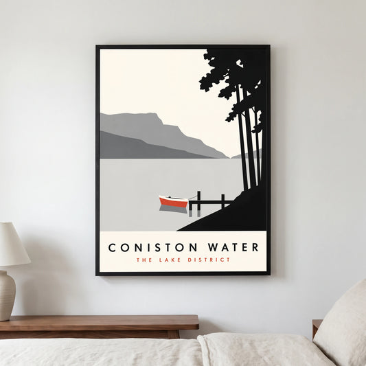 Coniston Water travel poster in a black frame, hanging in a bedroom3