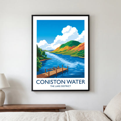 Coniston Water travel poster in a black frame, hanging in a bedroom3
