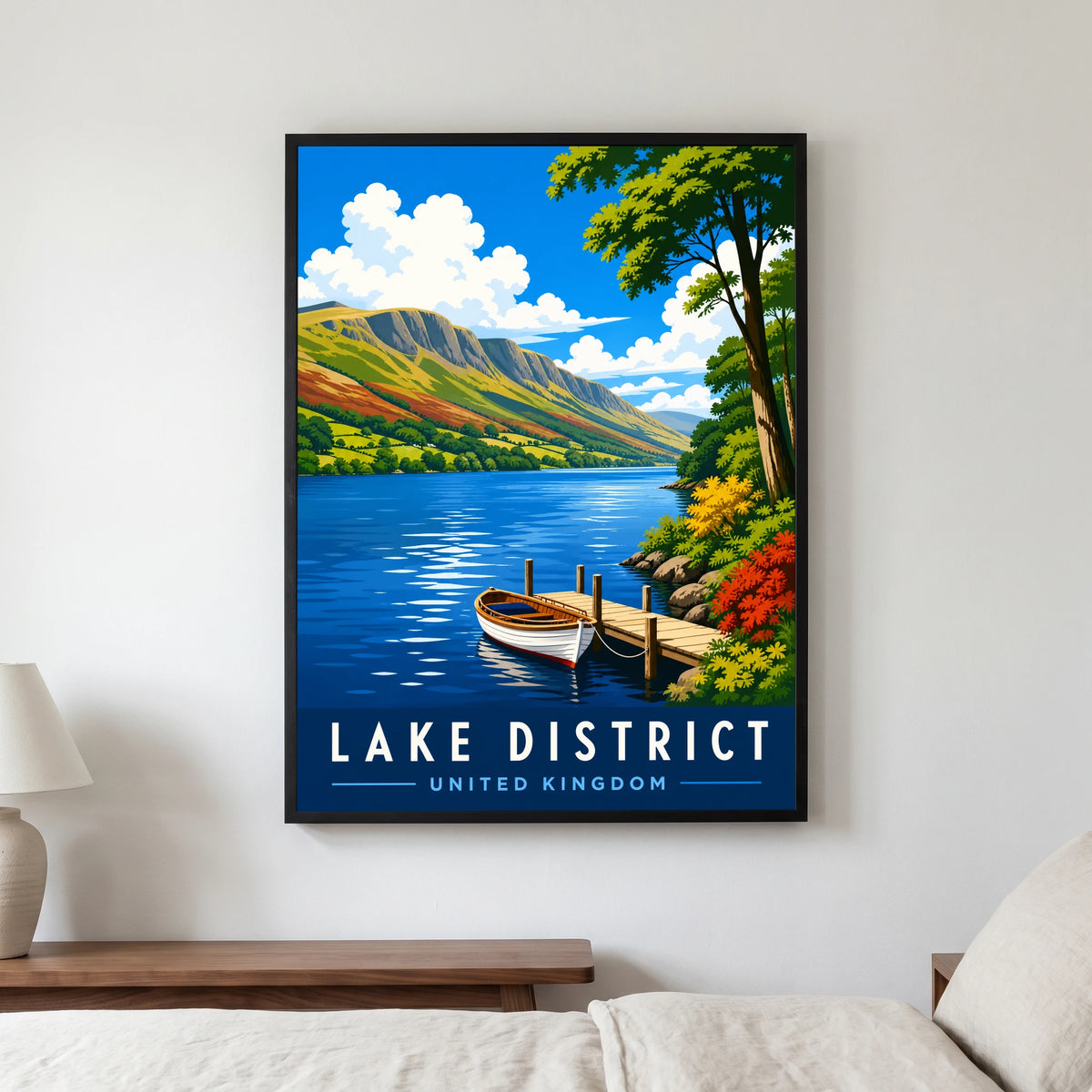 Coniston Water travel poster in a black frame, hanging in a bedroom3