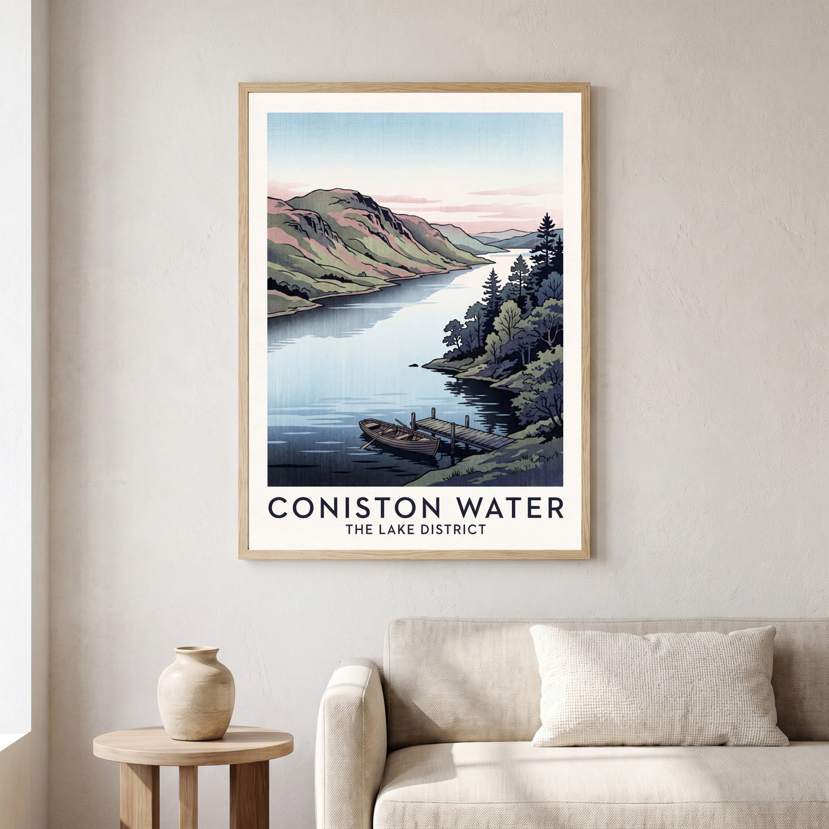 Coniston Water travel poster in a natural frame, hanging in a living