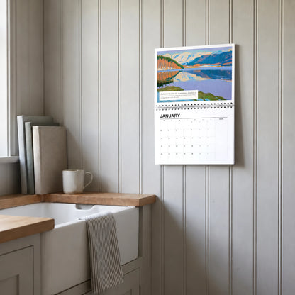 Derwentwater 2027 wall calendar hanging in a utility room