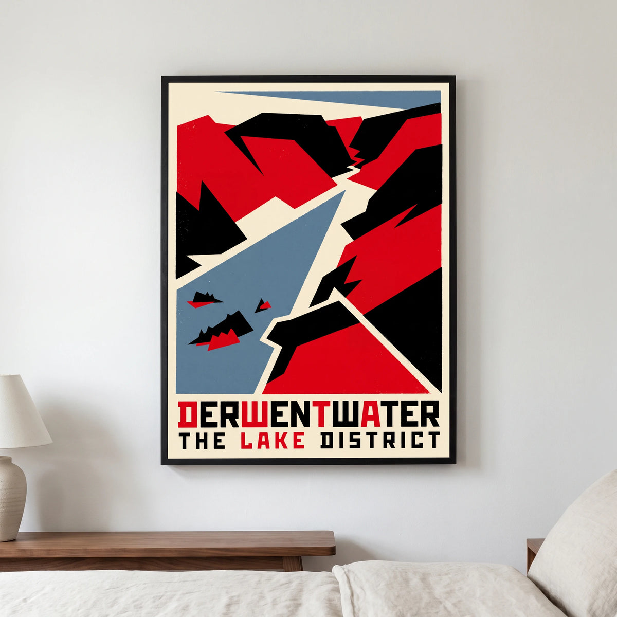 Derwentwater travel poster in a black frame, hanging in a bedroom3