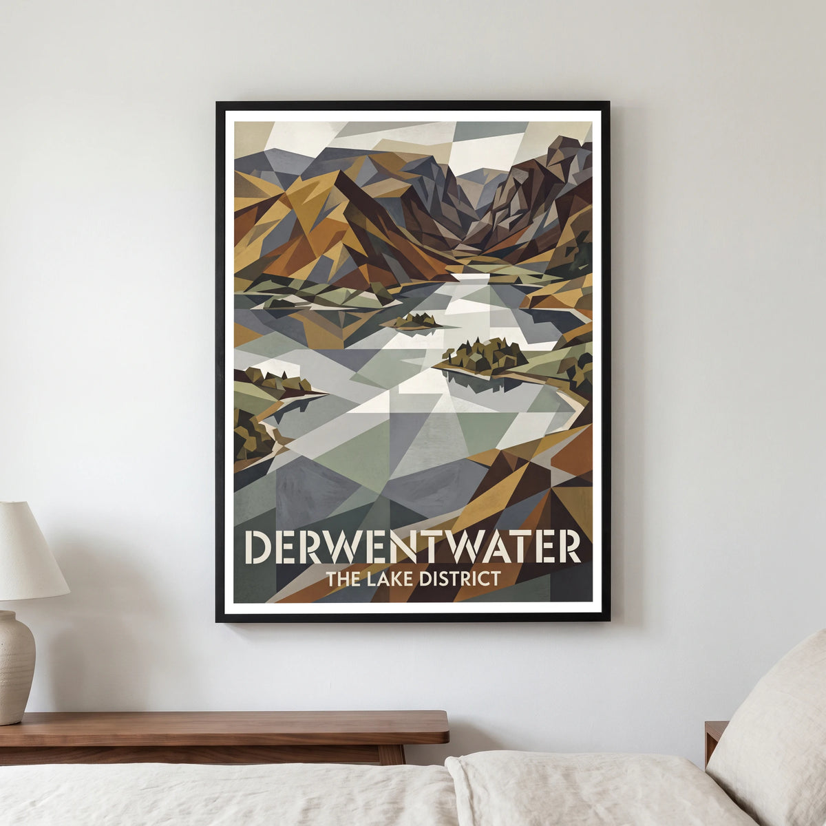 Derwentwater travel poster in a black frame, hanging in a bedroom3