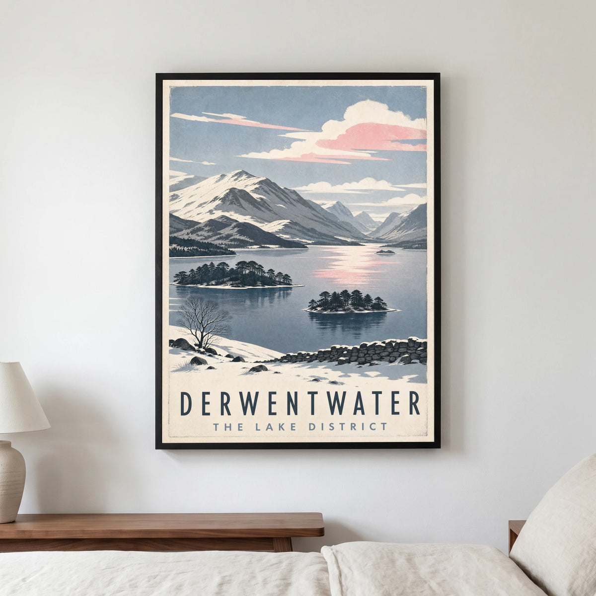 Derwentwater travel poster in a black frame, hanging in a bedroom3