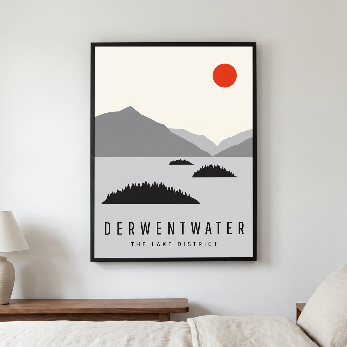 Derwentwater travel poster in a black frame, hanging in a bedroom3
