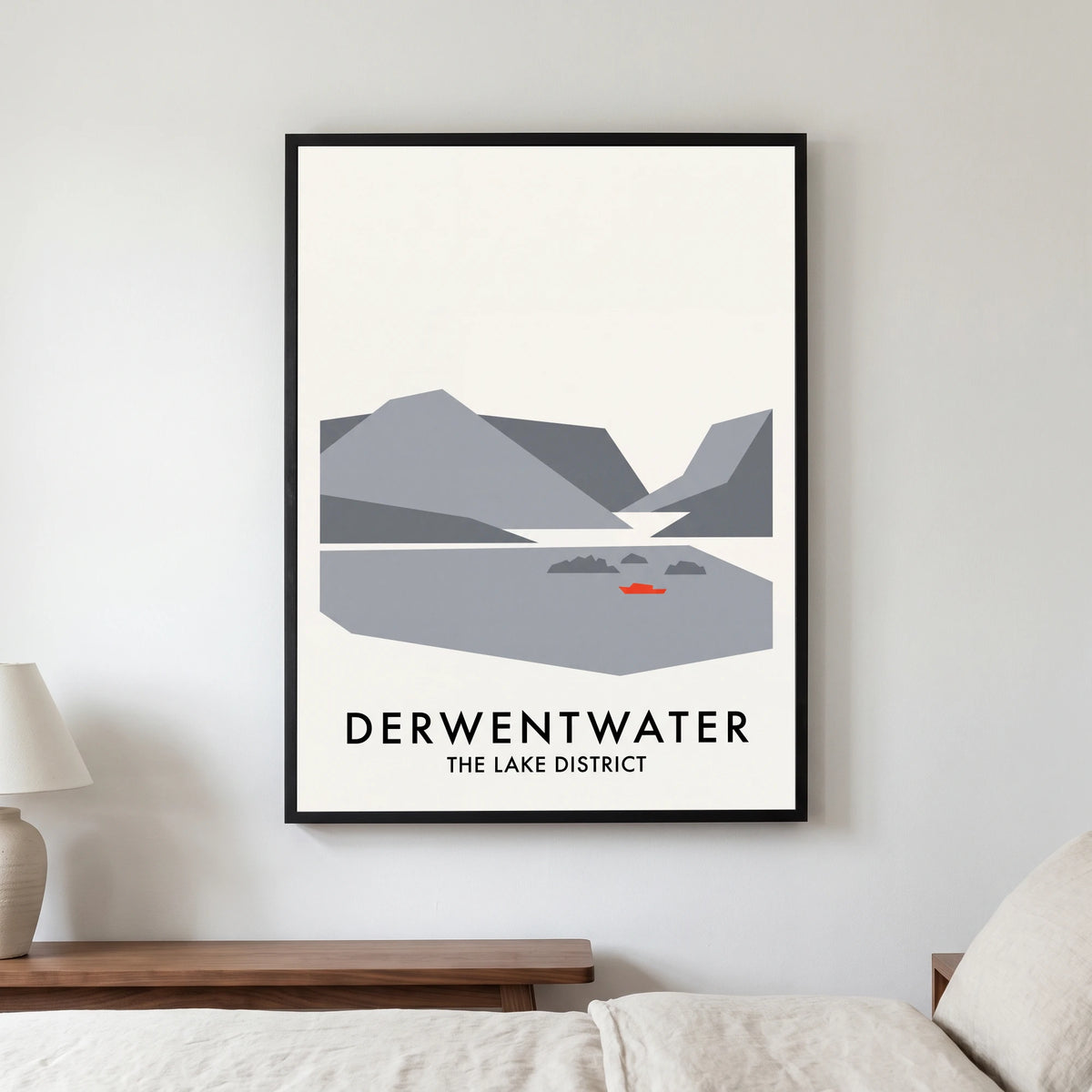 Derwentwater travel poster in a black frame, hanging in a bedroom3