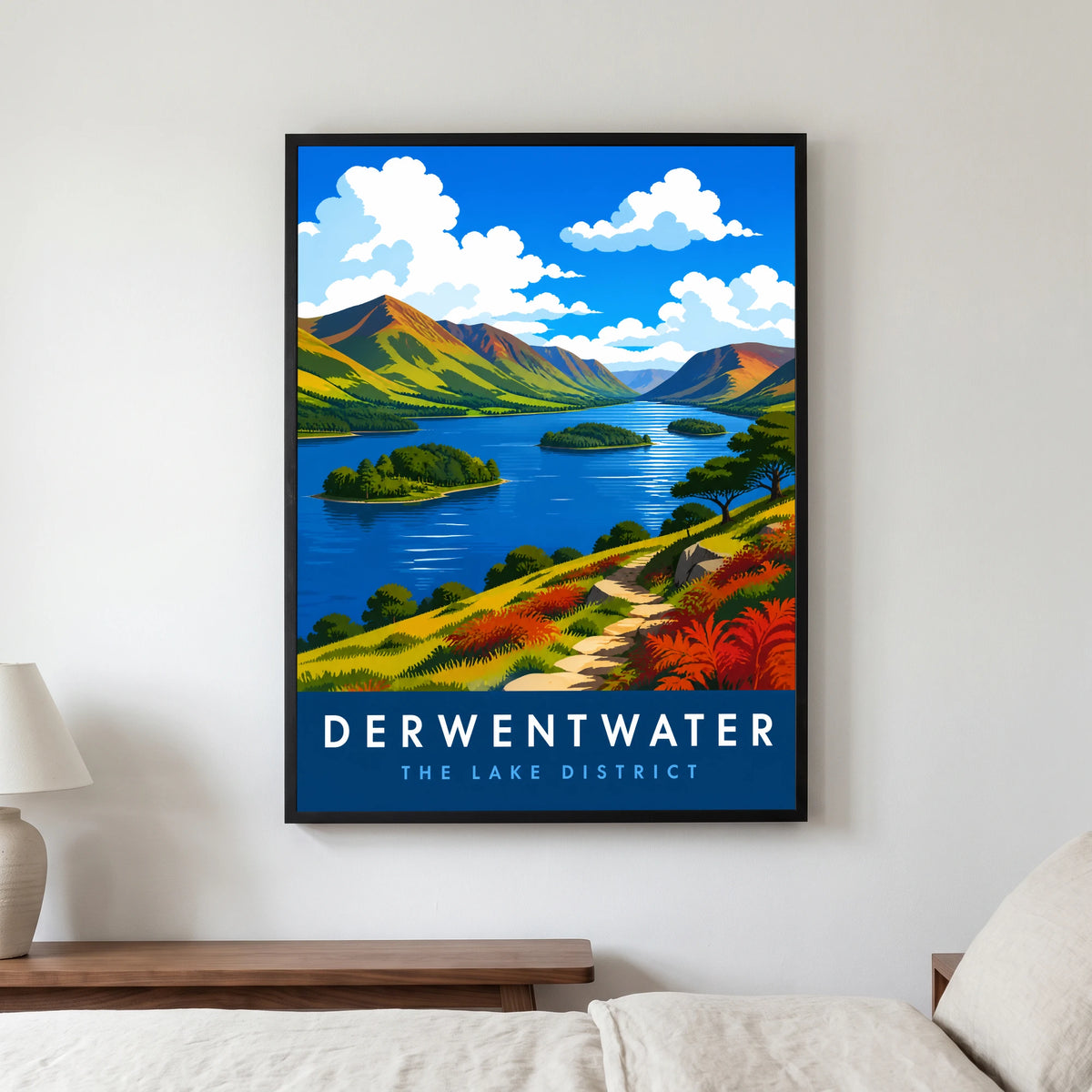 Derwentwater travel poster in a black frame, hanging in a bedroom3