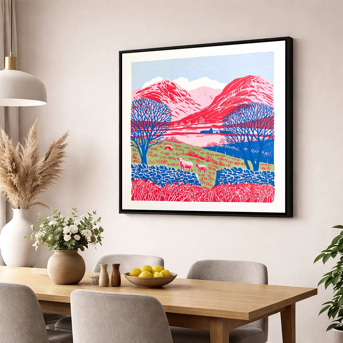 Bold Red Fells of Eskdale lake district valley wall art displayed in a dining room