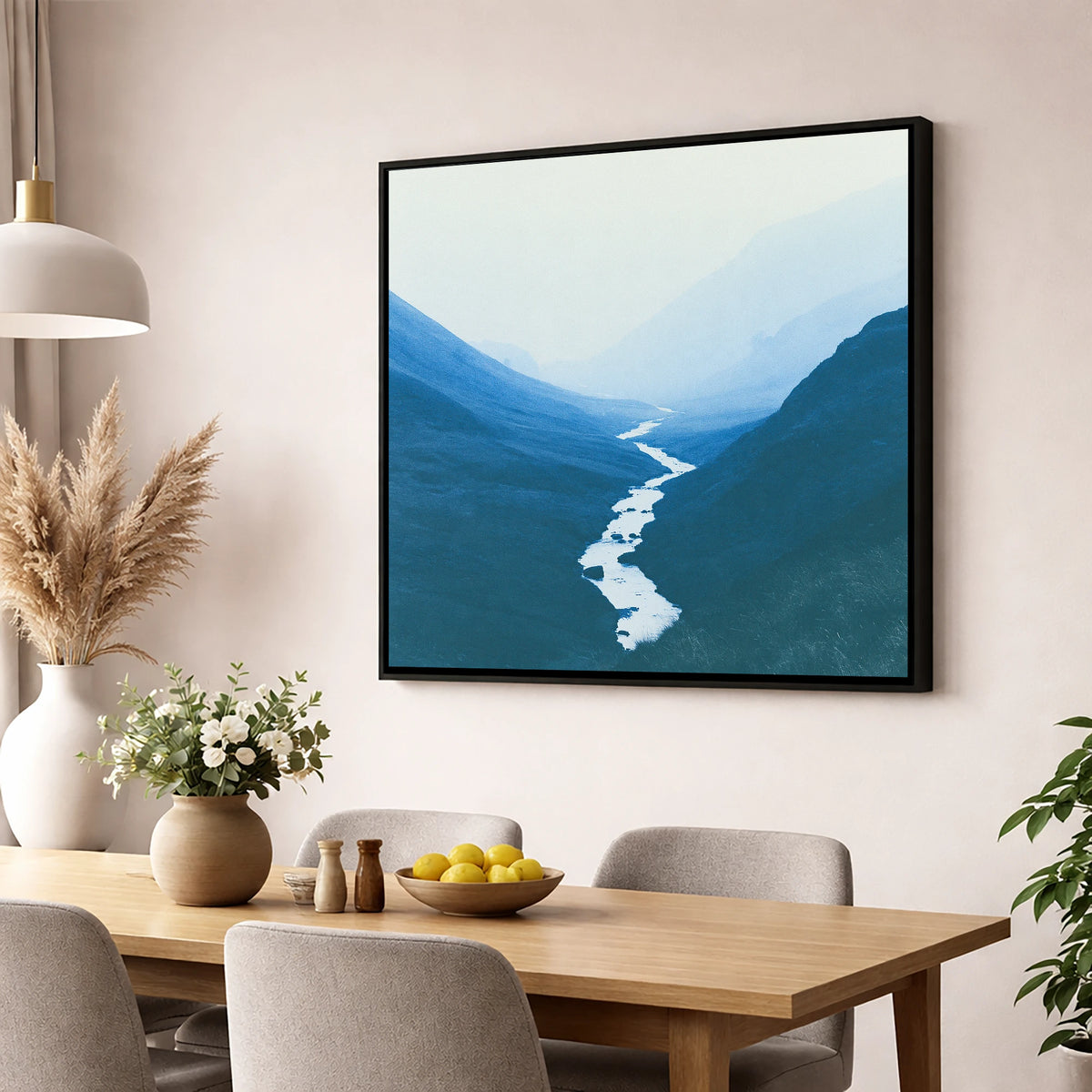 River Winding Through Blue Fells lake district waterfall wall art displayed in a dining room