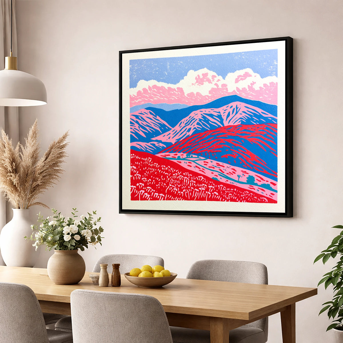 Red and Blue Rolling Fells lake district fell wall art displayed in a dining room