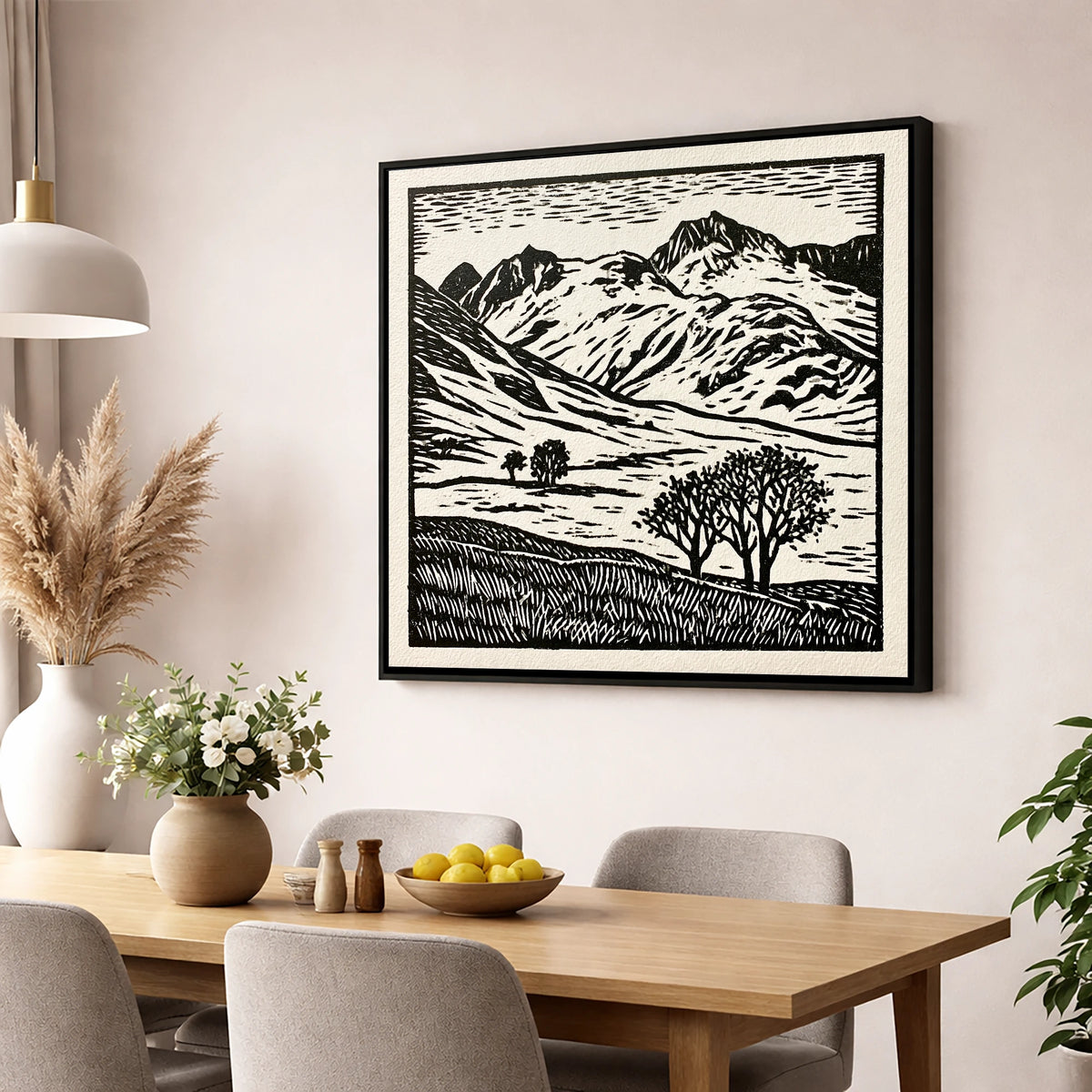 Monochrome Great Langdale Fells lake district valley wall art displayed in a dining room